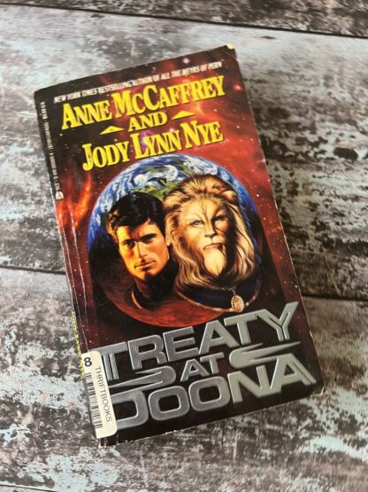 An image of a book by Anne McCaffrey and Jody Lynn Nye - Treaty at Doona