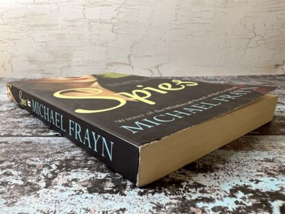 An image of a book by Michael Frayn - Spies