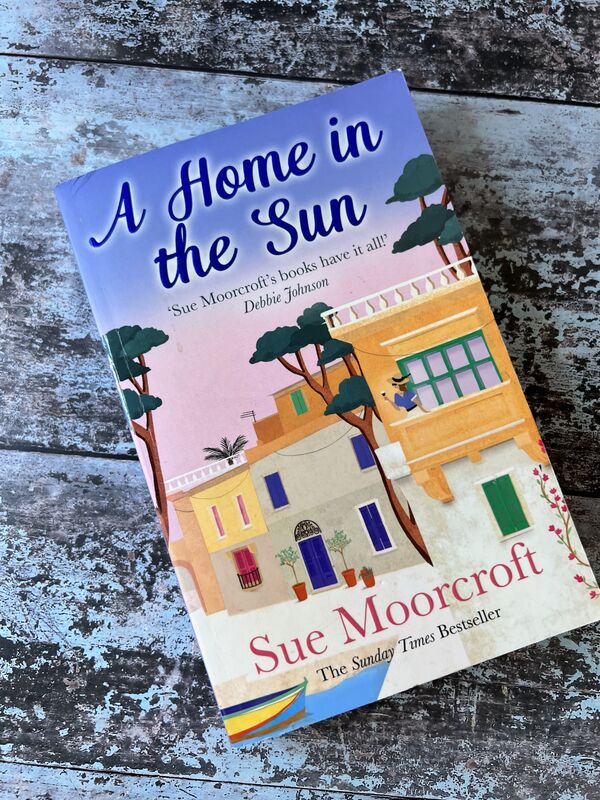 An image of a book by Sue Moorcroft - A Home in the Sun