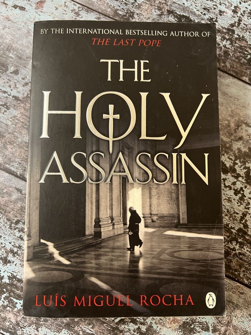 An image of a book by Luis Miguel Rocha - The Holy Assassin