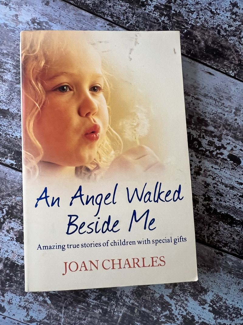 An image of a book by Joan Charles - An Angel Walked Beside Me