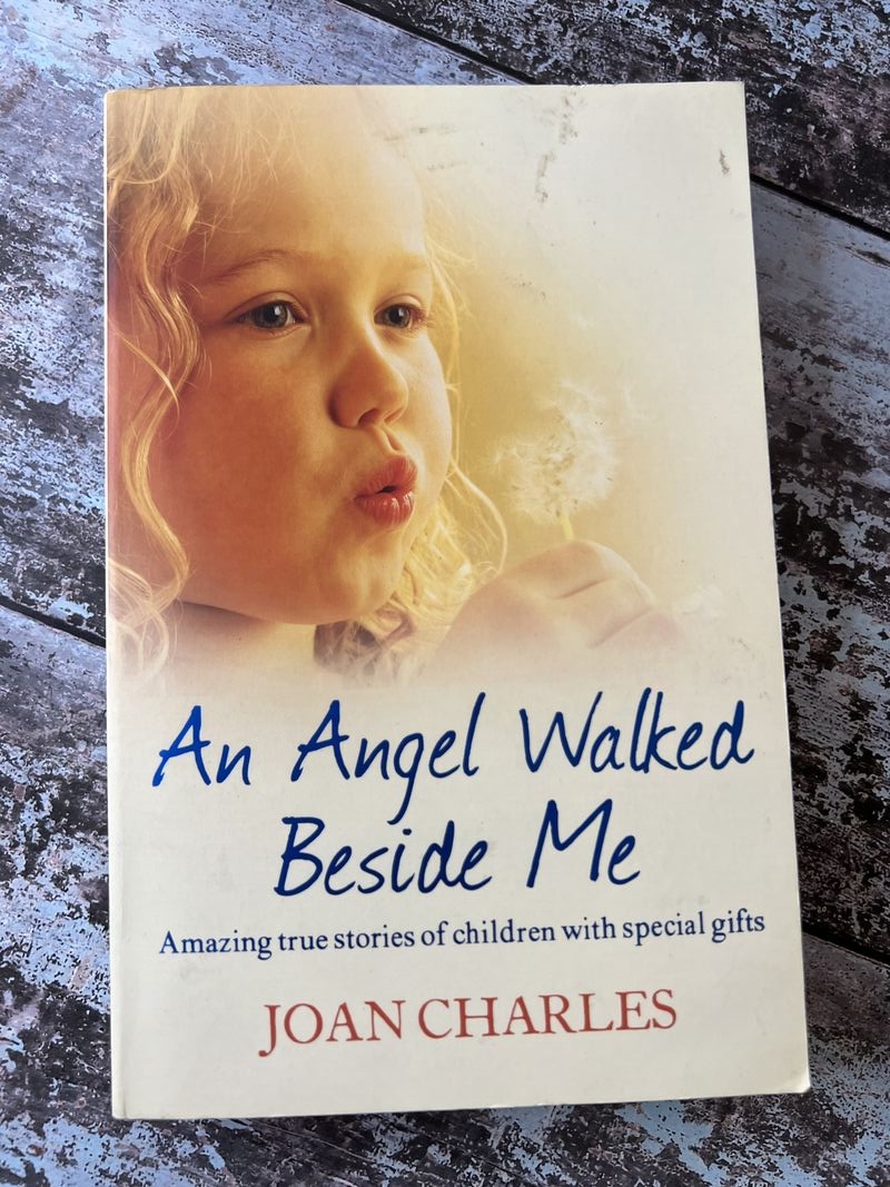 An image of a book by Joan Charles - An Angel Walked Beside Me