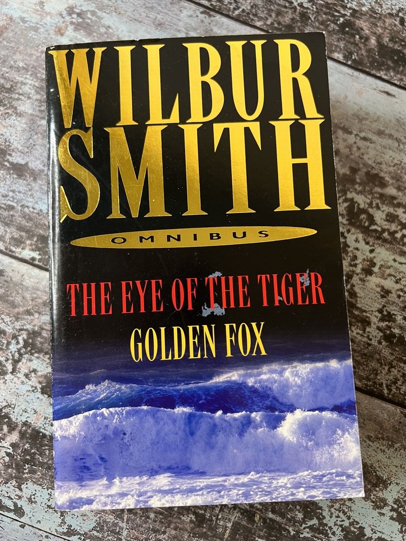 An image of a book by Wilbur Smith - The Eye of the Tiger and Golden Fox
