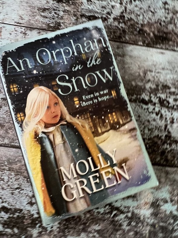 An image of a book by Molly Green - An Orphan in the Snow