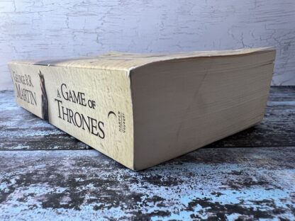 An image of a book by George R R Martin - A Game of Thrones