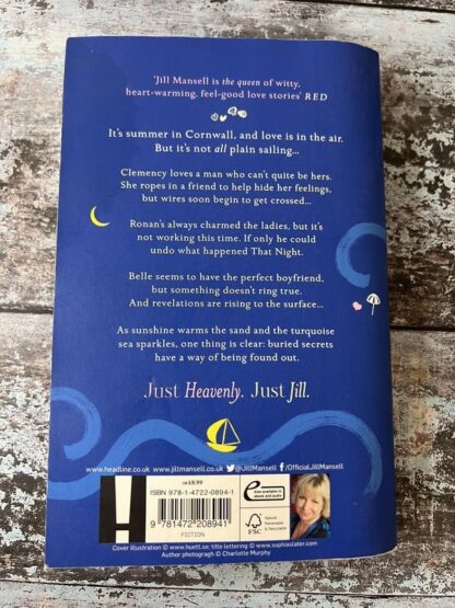 An image of a book by Jill Mansell - Meet Me at Beachcomber Bay