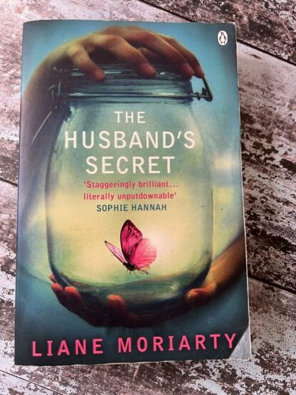 An image of a book by Liane Moriarty - The husband's Secret