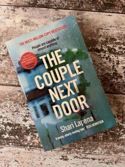 An image of a book by Shari Lapena - The Couple Next Door