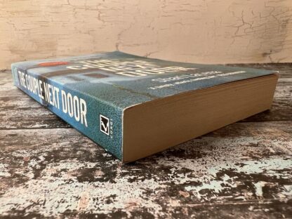 An image of a book by Shari Lapena - The Couple Next Door