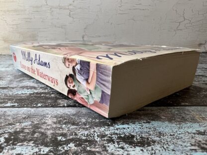 An image of a book by Milly Adams - Love on the Waterways