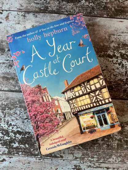An image of a book by Holly Hepburn - A Year at Castle Court