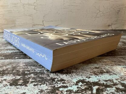 An image of a book by Laura Greaves - Dogs with Jobs