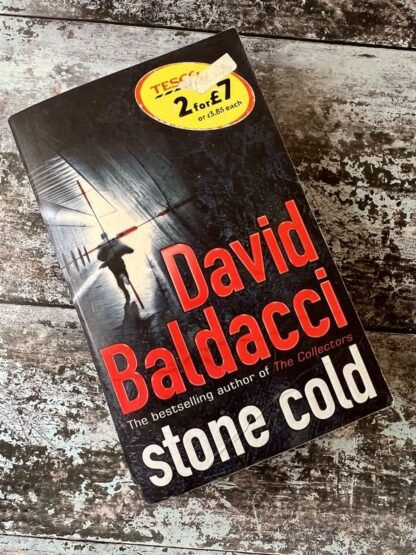 An image of a book by David Baldacci - Stone Cold
