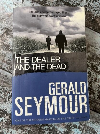 An image of a book by Gerald Seymour - The Dealer and the Dead