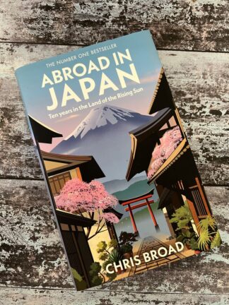 An image of a book by Chris Broad - Abroad in Japan