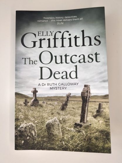 An image of the book The Outcast Dead by Elly Griffiths