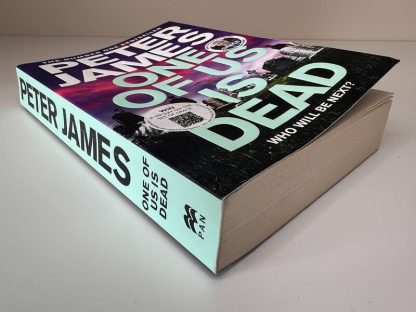 An image of the book One of Us is Dead by Peter James