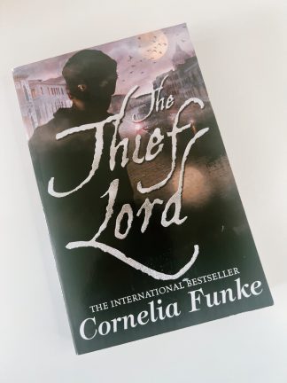 Affordable secondhand The Thief Lord by Cornelia Funke, paperback, very good condition, photo-verified, StrangeBooks UK