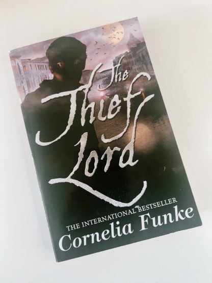 Affordable secondhand The Thief Lord by Cornelia Funke, paperback, very good condition, photo-verified, StrangeBooks UK