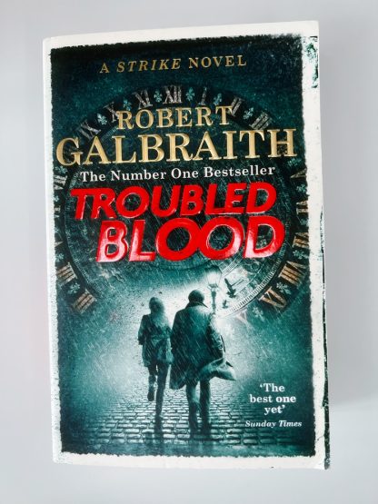 Affordable secondhand Troubled Blood by Robert Galbraith, paperback, very good condition, photo-verified, StrangeBooks UK