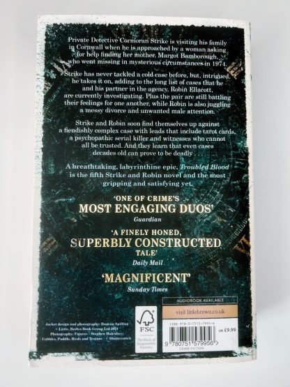 Affordable secondhand Troubled Blood by Robert Galbraith, paperback, very good condition, photo-verified, StrangeBooks UK