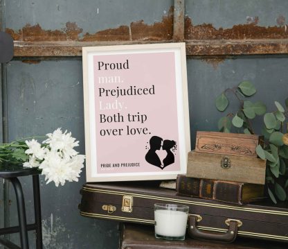 Humorous Pride and Prejudice print in white wooden frame, perched on a violin case next to some books. From Bookish Prints collection by StrangeBooks UK