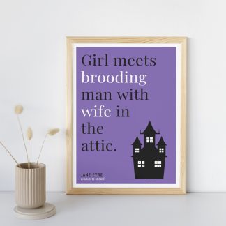 Humorous Jane Eyre print in wooden frame, leaning against a plain wall. Small beige decoration nearby. From Bookish Prints collection by StrangeBooks UK