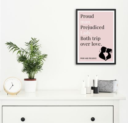 Humorous Pride and Prejudice print in black frame on wall, with white chest of drawers and plants and candles below. From Bookish Prints collection by StrangeBooks UK