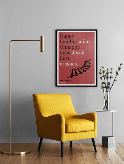 Humorous Anna Karenin print in black frame on wall, with a yellow armchair in front next to a tall angular lamp and plant on a table. From Bookish Prints collection by StrangeBooks UK