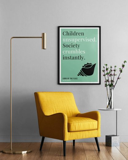 Humorous Lord of the Flies print in black frame on wall, with a yellow armchair in front next to a tall angular lamp and plant on a table. From Bookish Prints collection by StrangeBooks UK