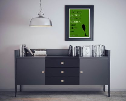 Humorous The Great Gatsby print in black frame on wall, with black sideboard and books below. From Bookish Prints collection by StrangeBooks UK