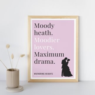 Humorous Wuthering Heights print in wooden frame, leaning against a plain wall. Small beige decoration nearby. From Bookish Prints collection by StrangeBooks UK