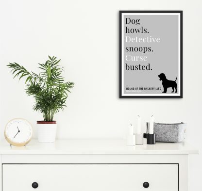 Humorous The Hound of the Baskervilles print in black frame on wall, with white chest of drawers and plants and candles below. From Bookish Prints collection by StrangeBooks UK