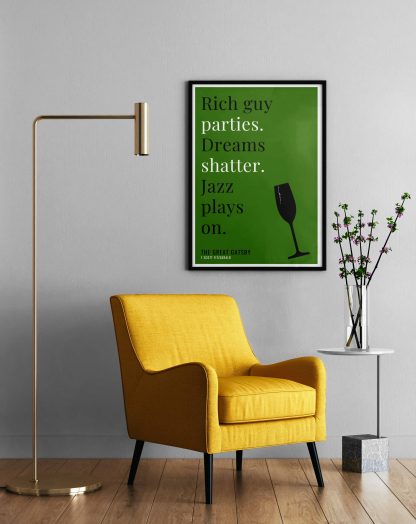 Humorous The Great Gatsby print in black frame on wall, with a yellow armchair in front next to a tall angular lamp and plant on a table. From Bookish Prints collection by StrangeBooks UK
