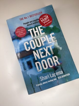An image of the book The Couple Next Door by Shari Lapena