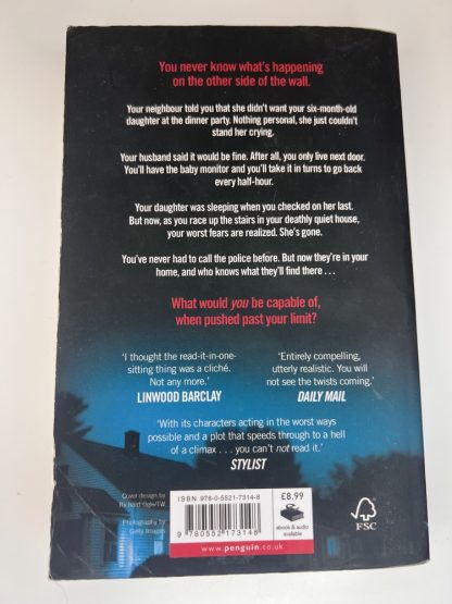An image of the book The Couple Next Door by Shari Lapena