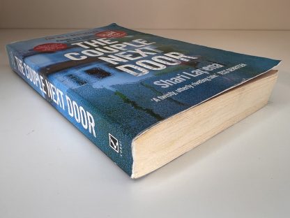 An image of the book The Couple Next Door by Shari Lapena