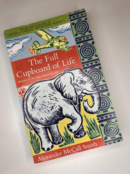 An image of the book The Full Cupboard of Life by Alexander McCall Smith