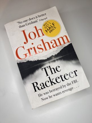 An image of the book The Racketeer by John Grisham