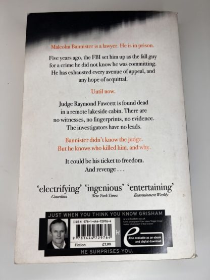 An image of the book The Racketeer by John Grisham