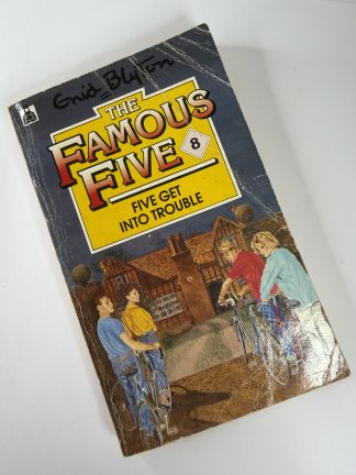 An image of the book Five Get Into Trouble by Enid Blyton