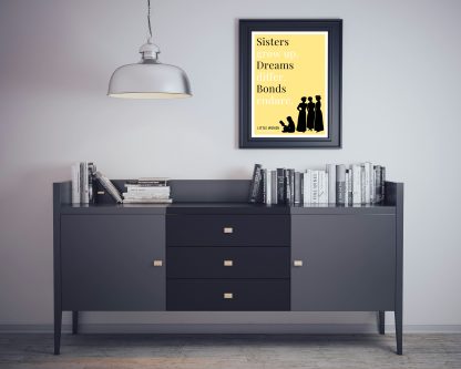 Humorous Little Women print in black frame on wall, with black sideboard and books below. From Bookish Prints collection by StrangeBooks UK