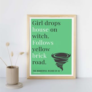 Humorous Wonderful Wizard of Oz print in wooden frame, leaning against a plain wall. Small beige decoration nearby. From Bookish Prints collection by StrangeBooks UK